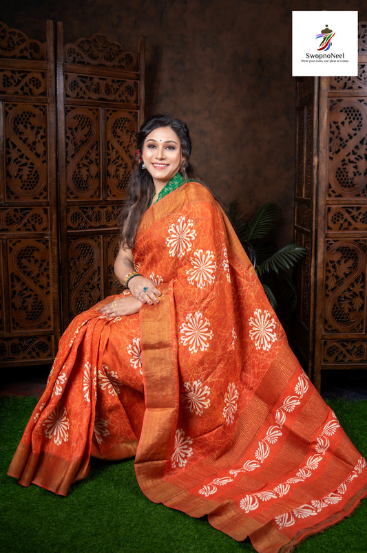 Rangrez Royale | Elegant Solid Orange and Floral Hand Block Printed Bapta Silk Saree with Blouse Piece